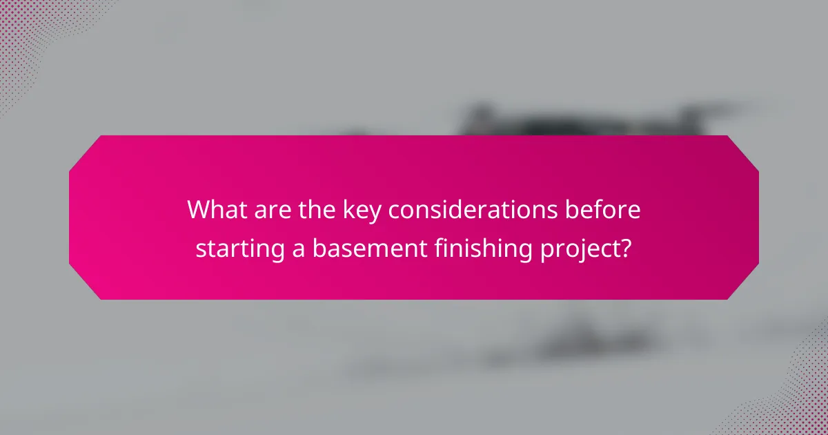 What are the key considerations before starting a basement finishing project?